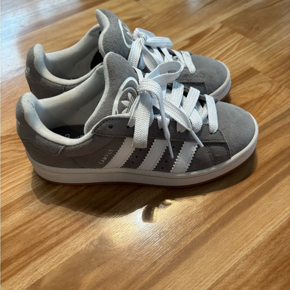 Gray and white Adidas Campus sneakers